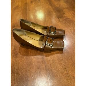 Woman’s Etienne Aigner leather pumps